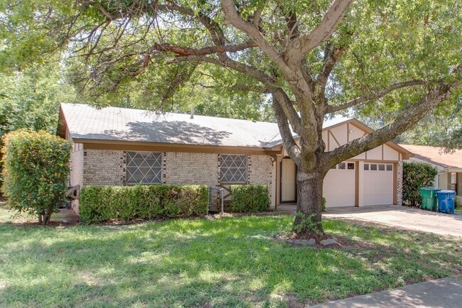 Building Photo - No Carpet! Great tree shaded yard!