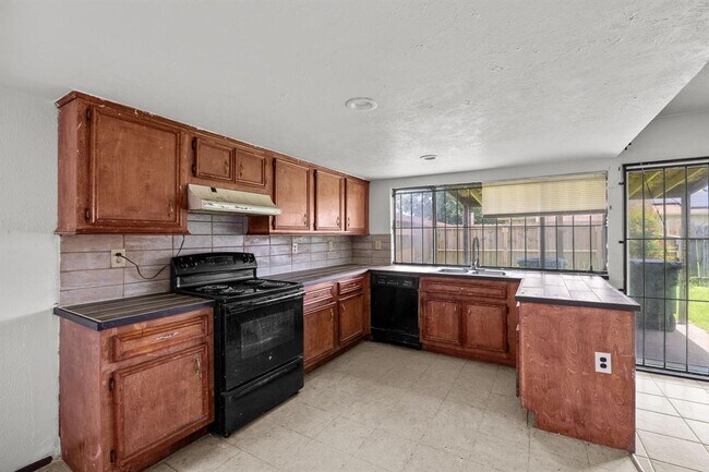 Building Photo - 15619 Fall Briar Dr