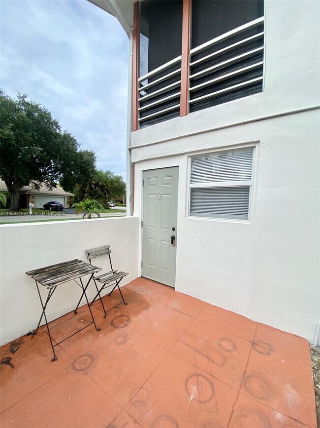 Building Photo - 3200 Coral Springs Dr