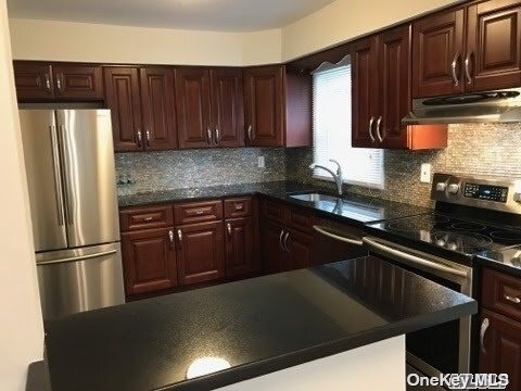 Building Photo - 208-40-208-15 15th Dr