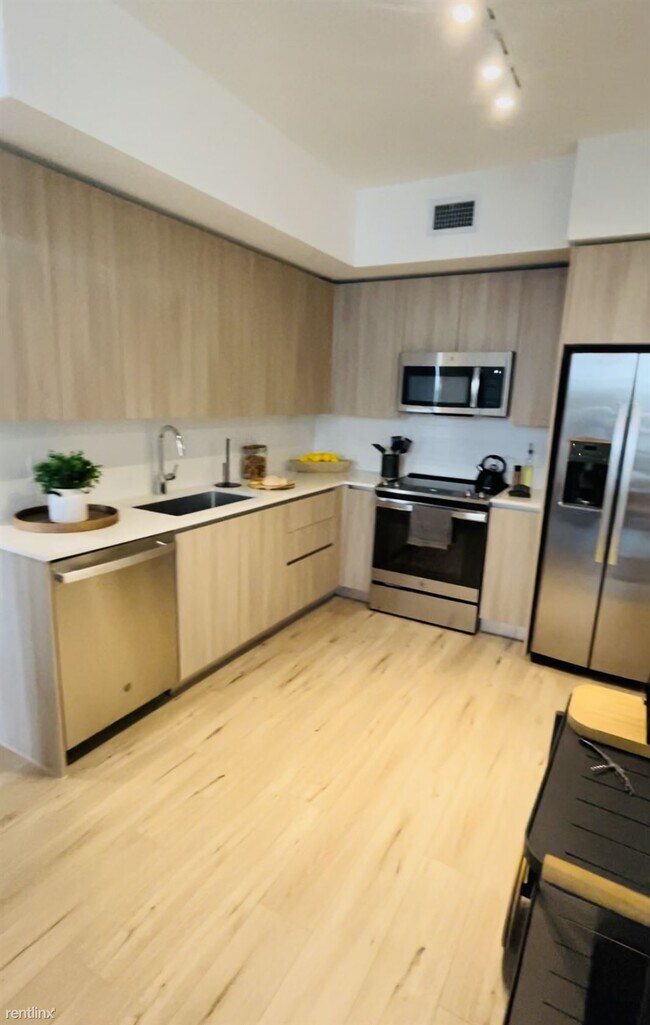 Building Photo - 3 br, 2 bath Condo - 4646 Palm Ave NUEVO C...
