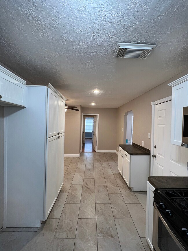 Kitchen with pantry on left - 2703 Thomas Ave