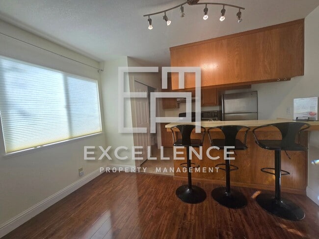 Building Photo - 2/1 With Updated Kitchen, Carport, Storage, Pool