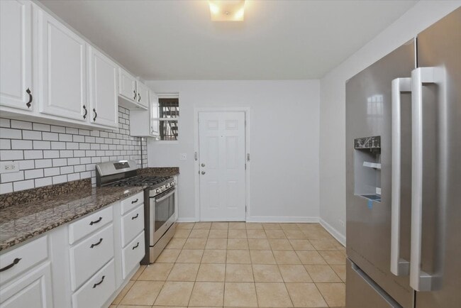 Building Photo - 6541 S Woodlawn Ave