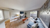Located at 6000 Hollister St in Houston, TX, this single-floor, one-bedroom, one-bathroom residence offers a thoughtfully organized layout across a compact yet functional footprint. The living room serves as the heart of the home, featuring wood-style flooring, neutral walls, and a sliding glass door that opens to a private outdoor patio, filling the space with natural light and providing a seamless indoor-outdoor connection. The kitchen is equipped with black appliances—including a range, refrigerator, and dishwasher—complemented by white cabinetry, granite-style countertops, and wood-style flooring, creating a clean and efficient cooking space. The bedroom is carpeted and generously sized, featuring a ceiling fan with light fixture and a large window that allows for ample natural light. A dedicated closet provides practical storage. The bathroom includes a granite-style vanity countertop, a shower-tub combination with tile surround, and warm neutral finishes throughout. The overall ambiance of the residence is calm and modern, with a consistent neutral color palette, functional finishes, and practical amenities that make this an ideal space for comfortable single-occupant or couple living in northwest Houston.
