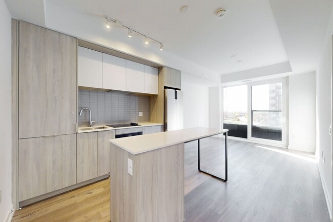 Photo du bâtiment - 395-395 Square One Dr