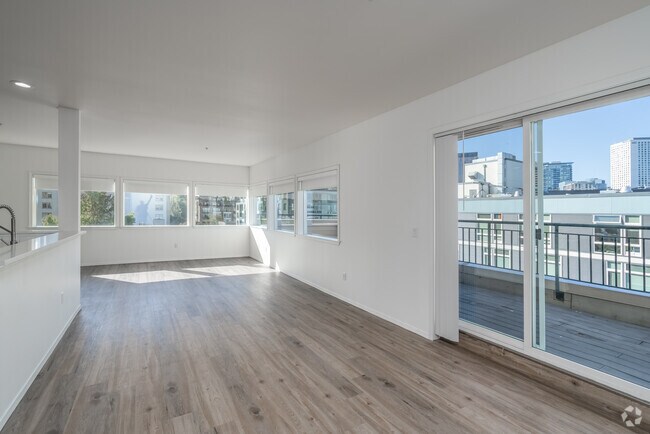 2 habitaciones, 2 baños - 1100 pies cuadrados - Sala de estar - Hawthorne Apartments