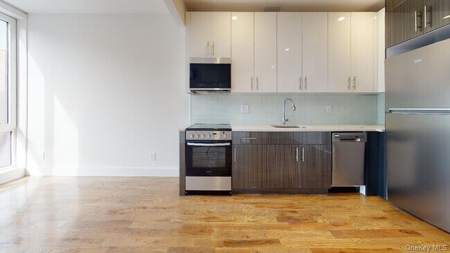 Building Photo - 138-28 Queens Blvd