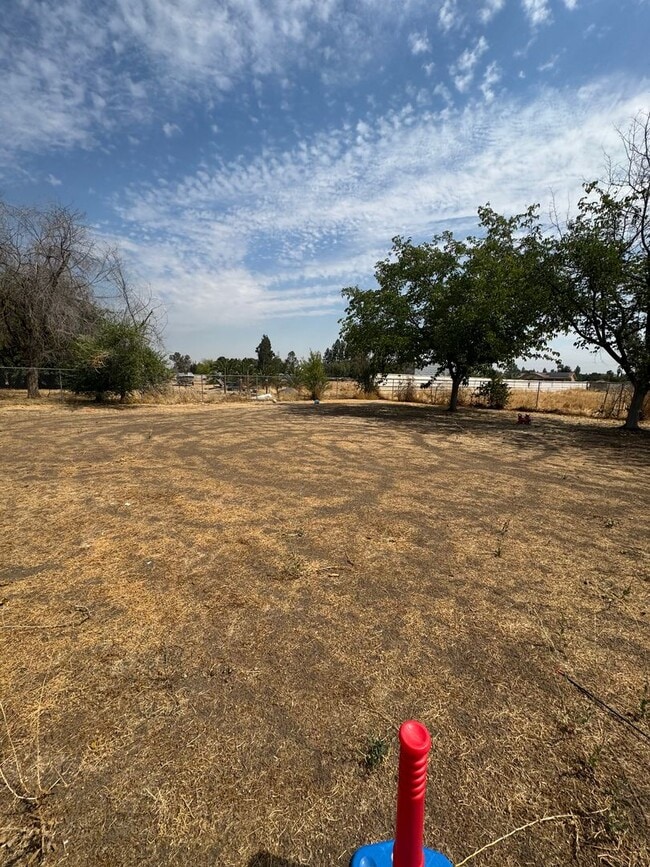 Building Photo - Spacious 4 Bedroom, 2 Bath Home with Solar...
