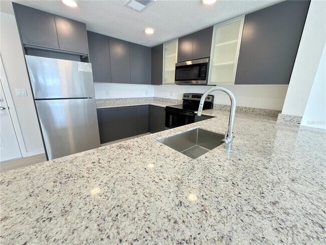 Foto del edificio - 5563 Millennia Park Dr