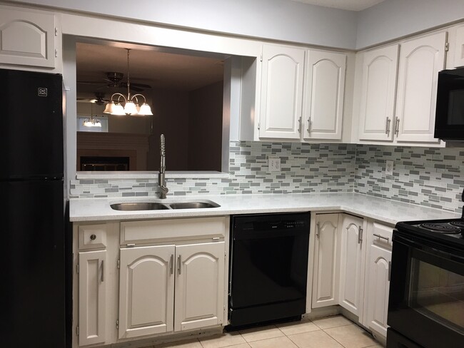 Building Photo - Upgraded 2BR/2.5BA Townhome for Rent – $1,...