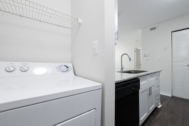 Renovated Laundry - The Residence at White River Apartments