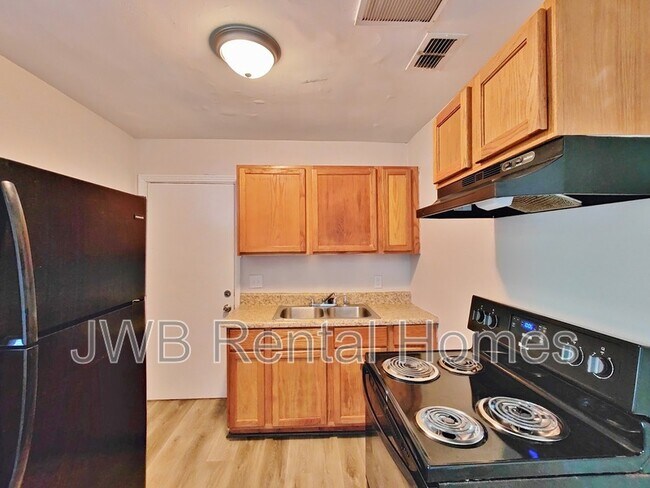 Building Photo - 5542 Minosa Cir E