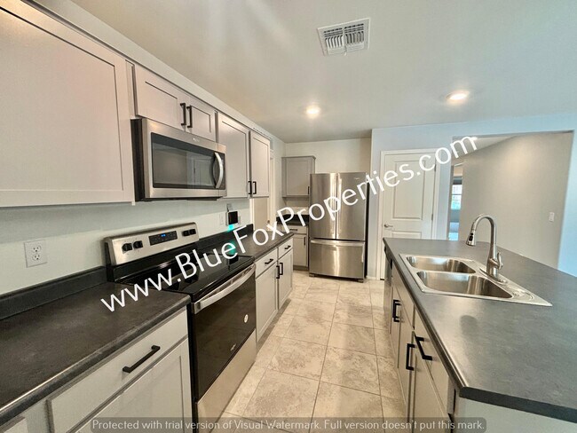 Foto del edificio - 7880 N Scholes Ave