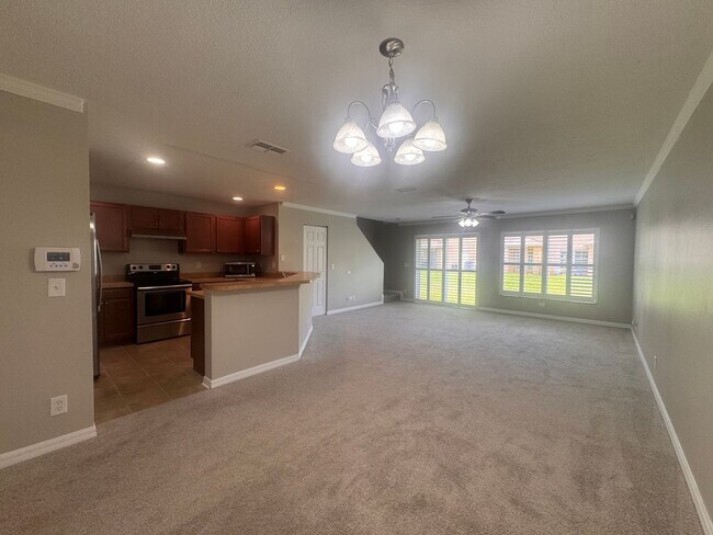 Building Photo - Coming Soon! 3BR/2.5BA | Newly Renovated Townhome | 1-Car Garage Parking | Community Pool!