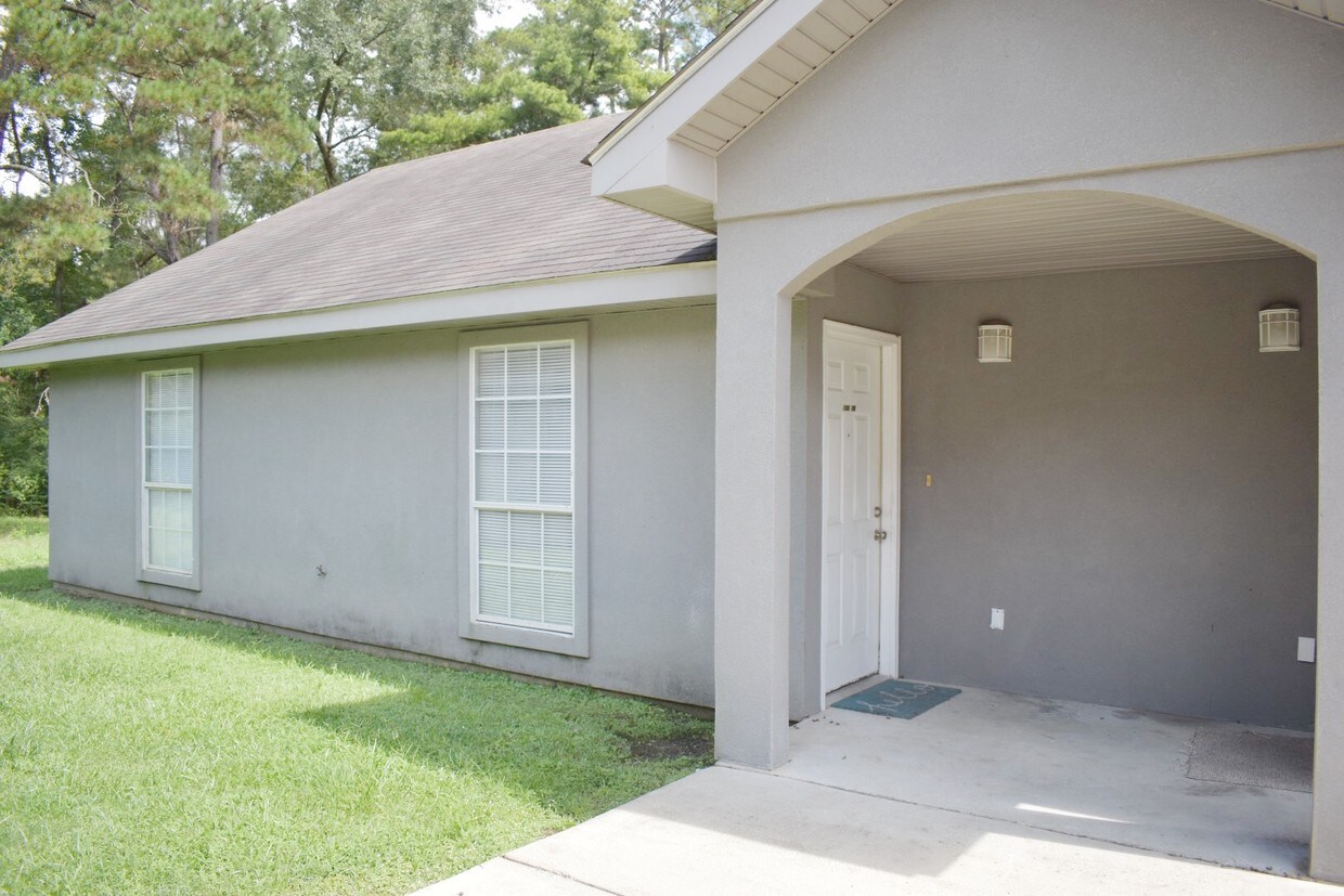 covered entry way in front and patio in back - 19213 Esterbrook Rd