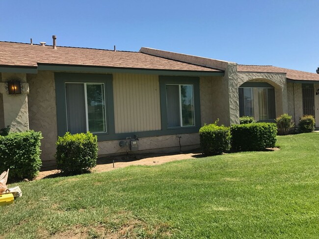 Building Photo - Nicest Unit at Plaza West..with grounds li...