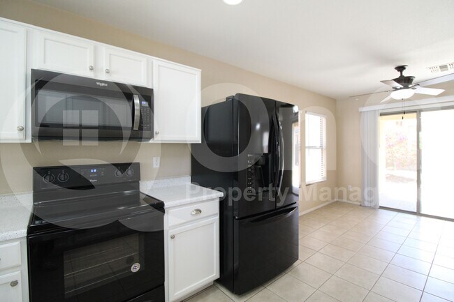 Building Photo - 6333 W Valencia Dr