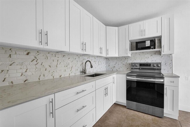 Building Photo - 3541 NW 7th Pl