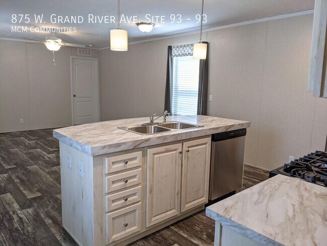 Building Photo - 875 W. Grand River Ave. Site 93
