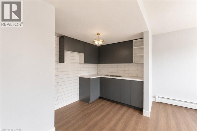 Building Photo - 355 E MAIN Street E Unit# #2
