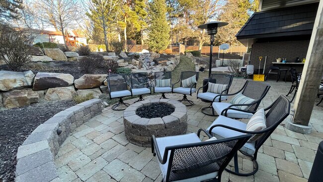 Secluded back yard with a fire pit - 4343 S Lynne Ln