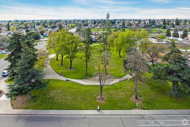 Crestwood Park has tall trees and walking paths