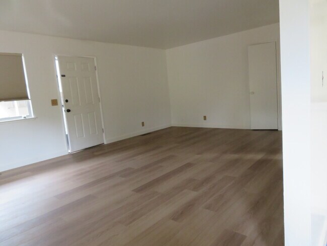 Living room with new wood floor - 39 Montgomery St