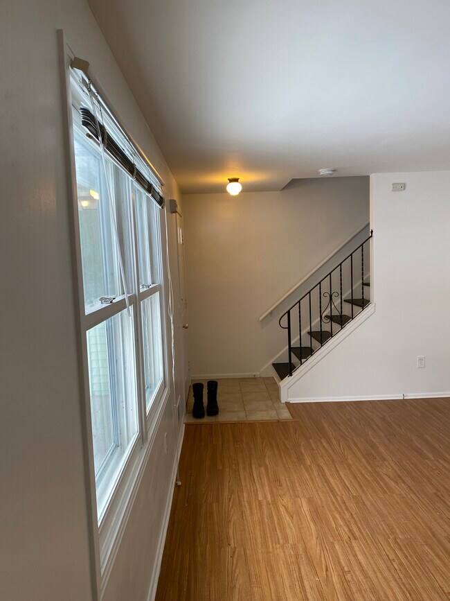 Front main entry door leading to living room and staircase - 4308 Lake Ave