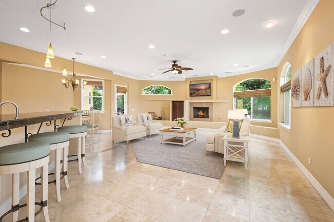 Building Photo - Stunning custom home in a highly sought-af...