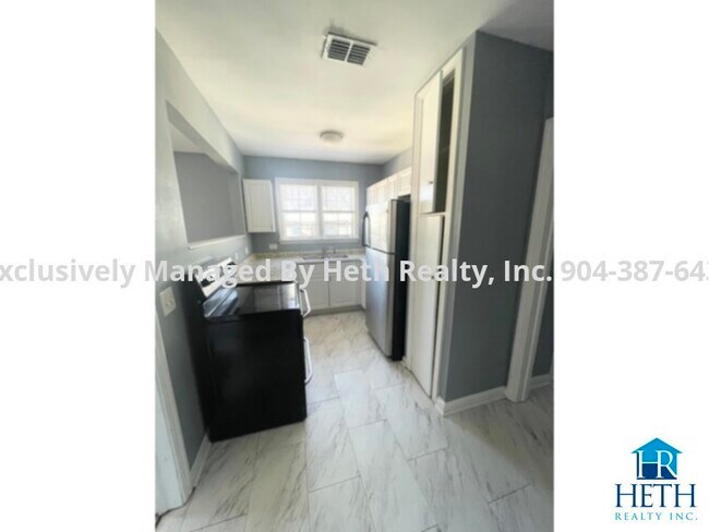 Foto del edificio - Riverside Apartment