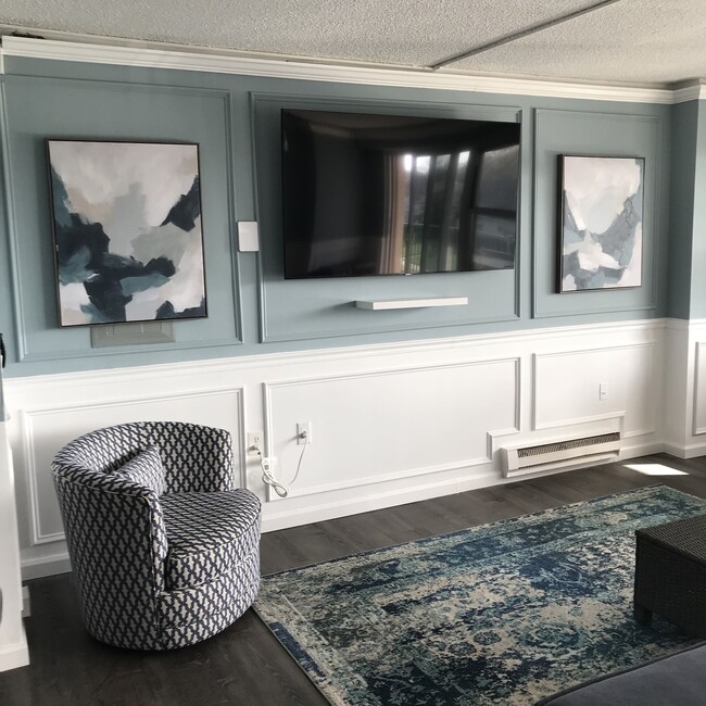 Open concept living area. Two TVs mounted and ready! - 480 Ocean Ave