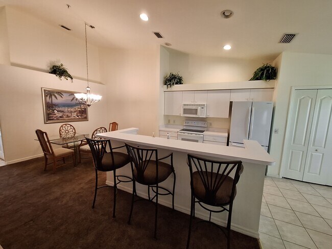 Dining room kitchen vaulted ceiling - 21301 Lancaster Run