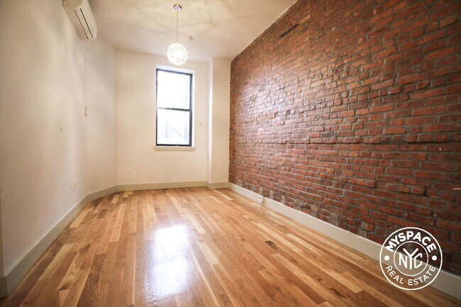 Building Photo - 305 Malcolm X Blvd