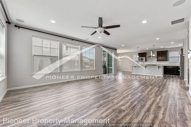 Building Photo - 4 br, 2.5 bath House - 11771 W Quarles Ave