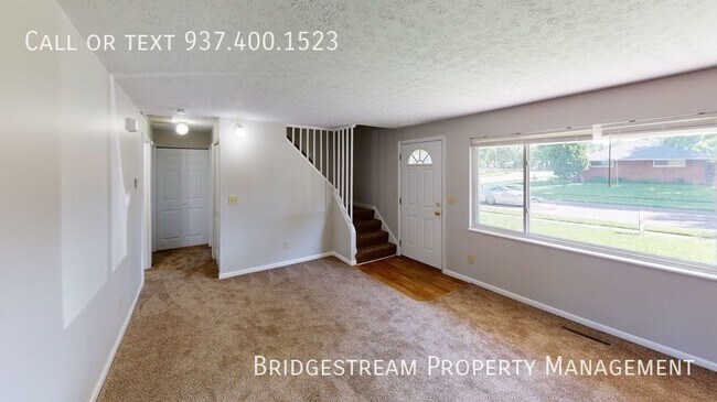 Building Photo - 4 bed, 2 full bath home with 1 car attache...