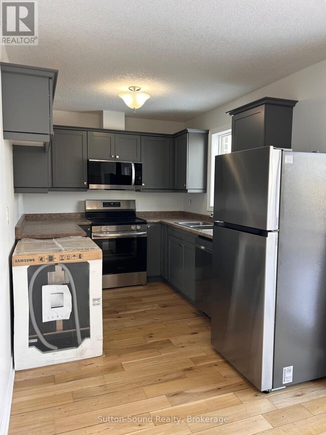 Photo du bâtiment - 1392 14th Ave E