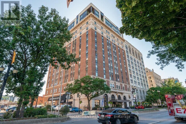 Building Photo - 112-112 King St E