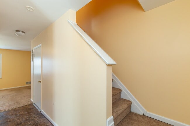Photo - Spacious end-unit three-level townhome featuring 2 bedrooms and 2.5 bathrooms