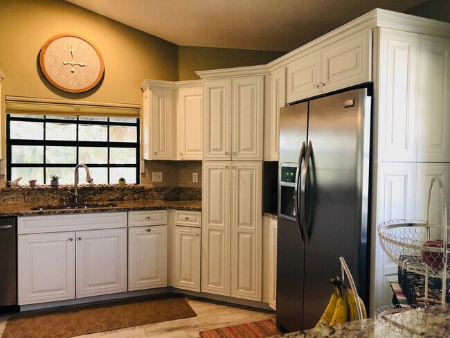Building Photo - Experience the Gated Waterfront Community,...