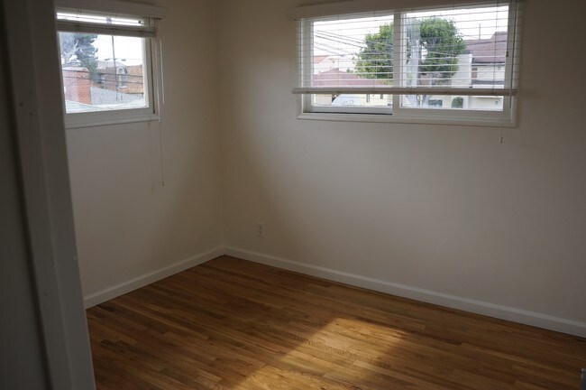 Unit B -bedroom refurbrished hardwood floors - 2318 Carnegie Ln