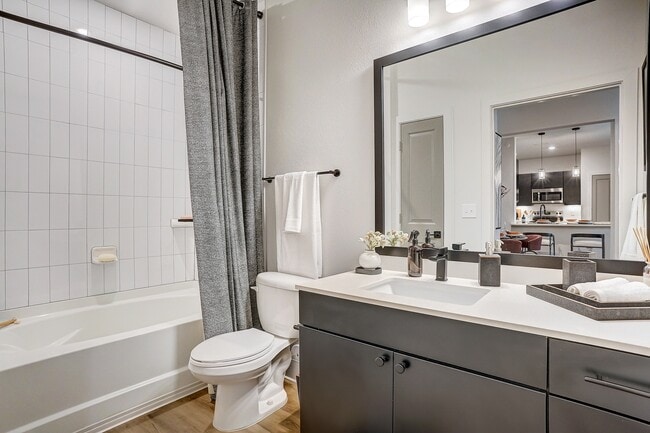 Bathroom with Quartz Countertop and Soaking Tub - The Parian Mooresville
