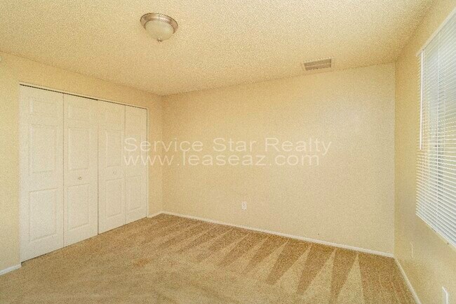 Building Photo - 6145 W Encanto Blvd