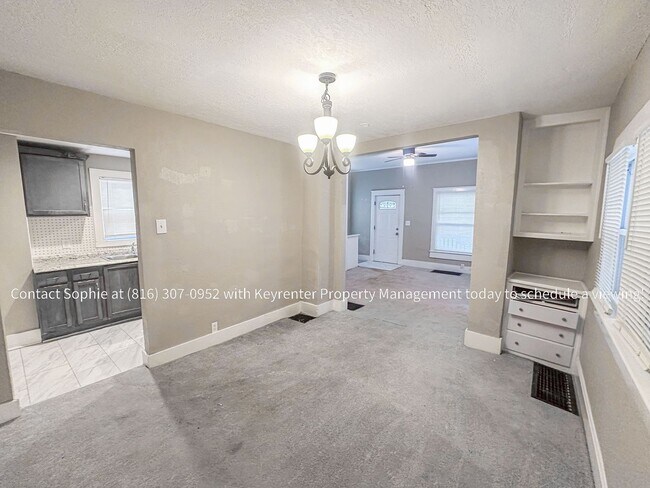 Foto del edificio - 6215 E 9th St