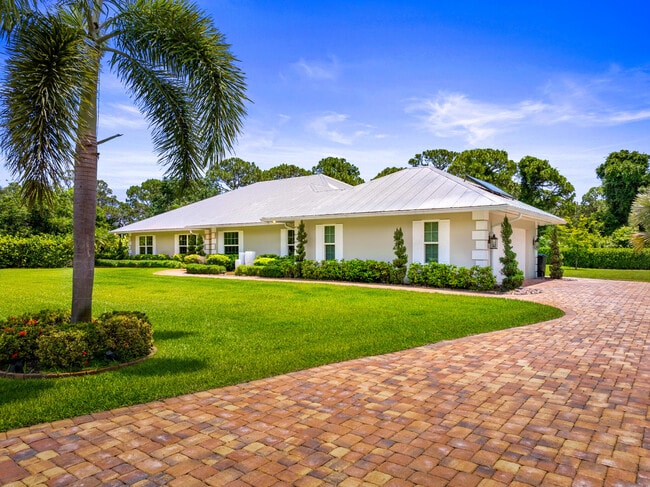 Foto del edificio - 7903 Plantation Lakes Dr