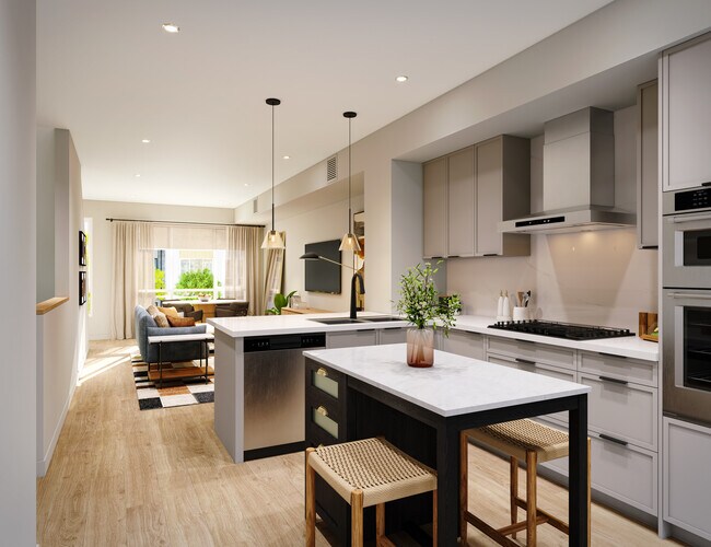 Cocina de la casa adosada de 3 habitaciones Signature Collection I con gabinetes de color gris claro, encimera de cuarzo de mármol y protector contra salpicaduras, electrodomésticos de acero inoxidable renovados y pisos de tablones de vinilo de superficie dura en toda la casa (representación) - Avalon Pleasanton