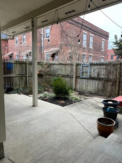Private patio with electric outlets for grills/ lighting - 215 Thurman Ave