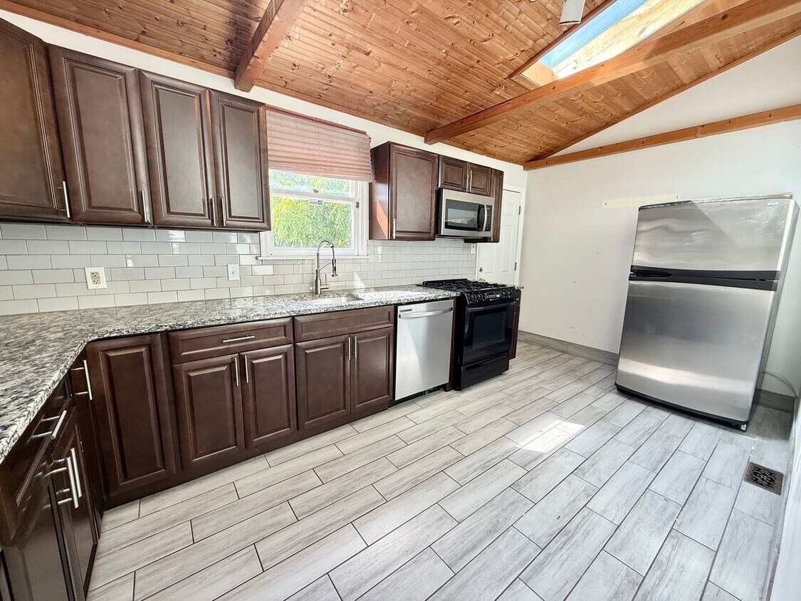 Primary Photo - Spacious 4-Bedroom Home with Modern Update...