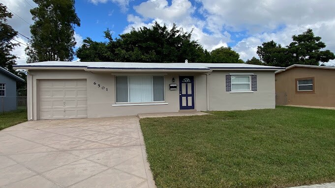 Single Family Home - 6501 NW 24th St