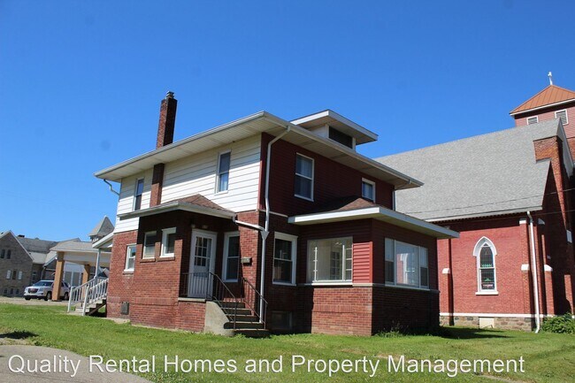 Building Photo - 4 br, 1 bath House - 810 E. Mt. Morris Rd.